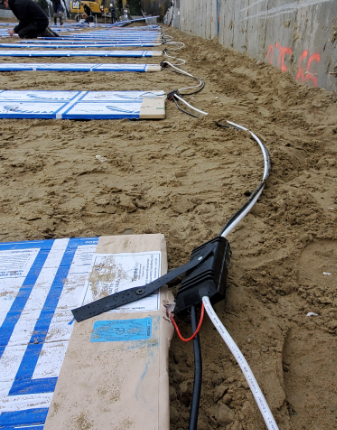 Laying wire under new carpet.